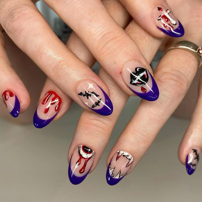 Nails with artistic designs in red, white, and purple on a neutral background