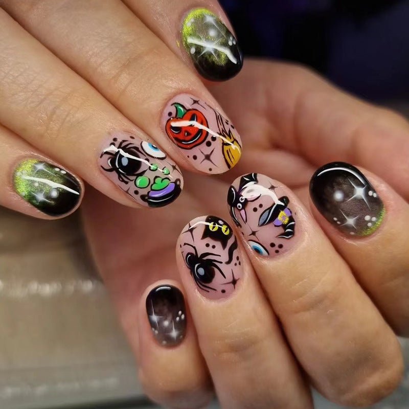 Cosmic Carnival Oval Short Black and Multi-Color Press On Nail Set with Funky Graphic Designs