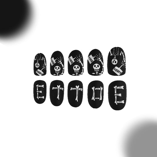 Spooky Skeleton Design Long Length Almond Black Press On Nail Set with Unique Skull and Bone Art