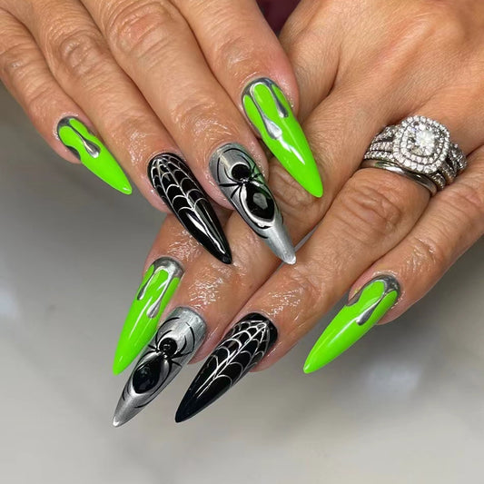 Spooky Spiderweb Green Stiletto Press On Long Nail Set with Silver Dripping Accents and Intricate Spider Designs