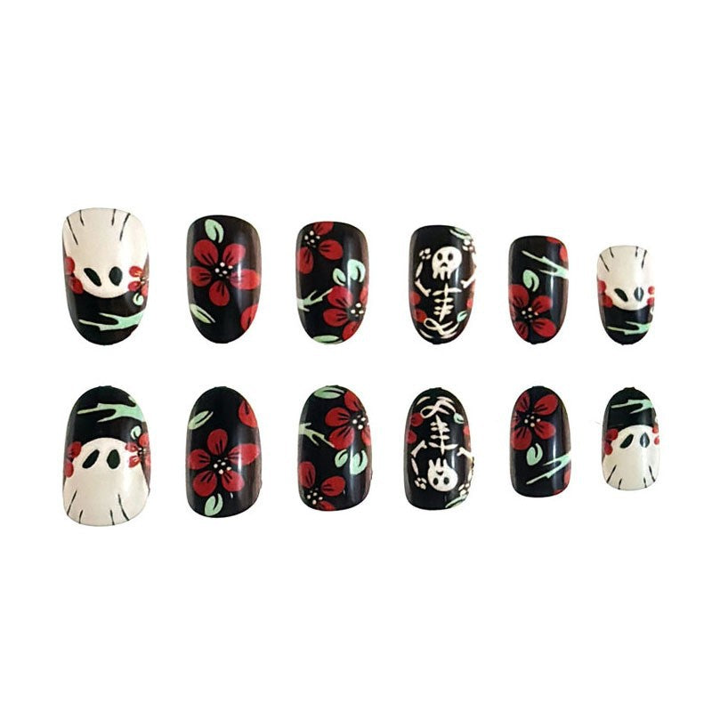 Spooky Floral Artistry Medium Oval Press On Nail Set Black with Red Flowers and Skull Designs