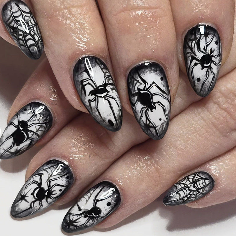 Spooky Chic Medium Almond Black Nail Set with Intricate Spider Design