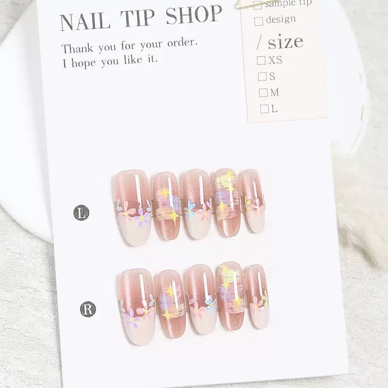 Whimsical Blossom Long Oval Pink Ombre Nail Set with Colorful Floral Accents