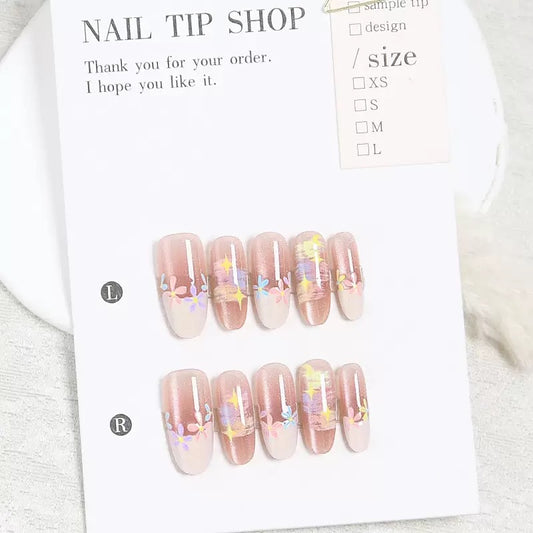 Whimsical Blossom Long Oval Pink Ombre Nail Set with Colorful Floral Accents