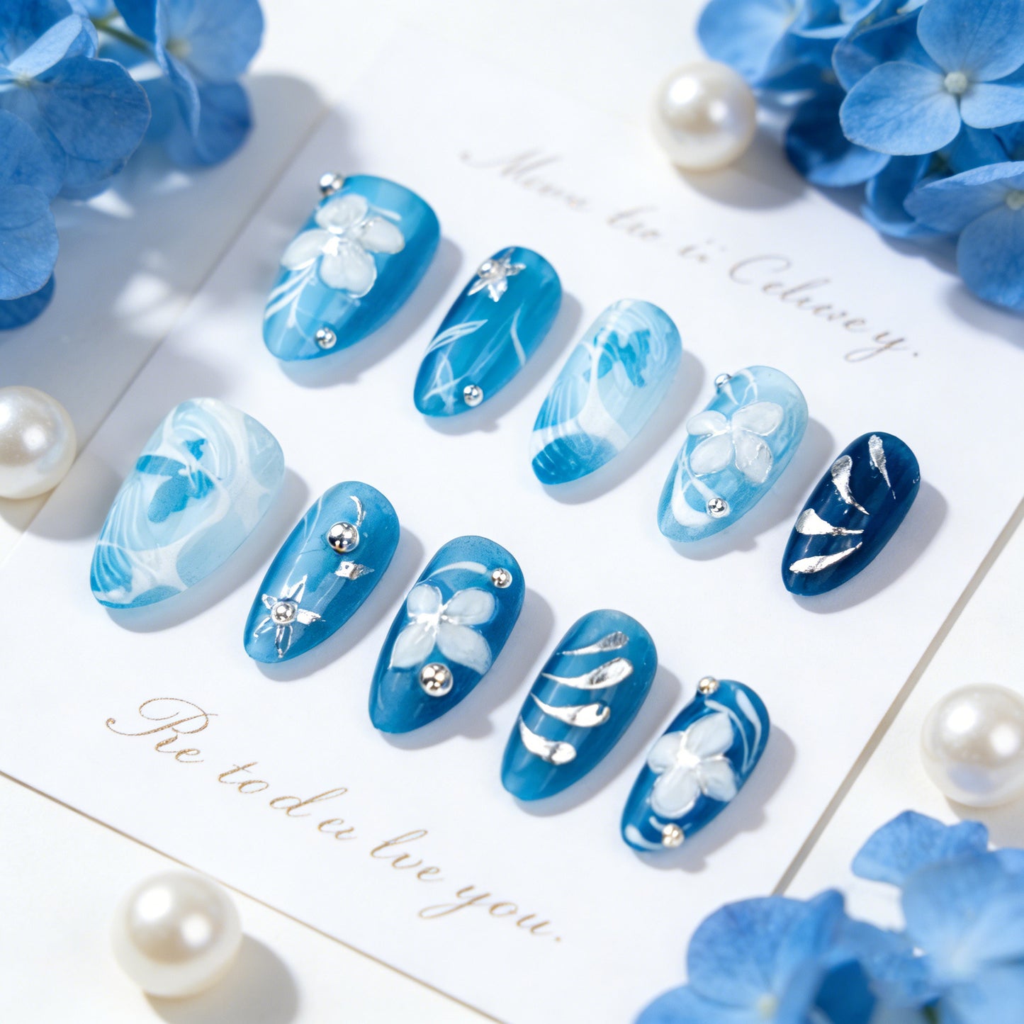 Aqua Blossom Medium Almond Press On Nail Set with Elegant Floral Design