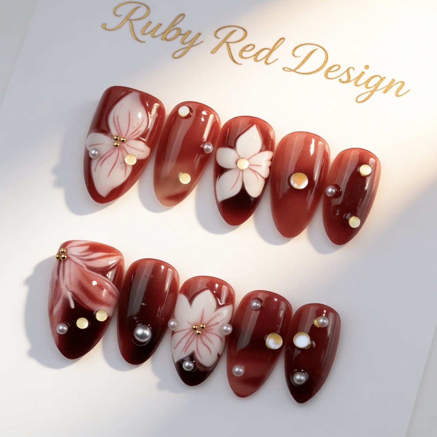 Blossom Elegance Short Almond Ruby Red Press On Nail Set with Floral Accents and Pearl Details