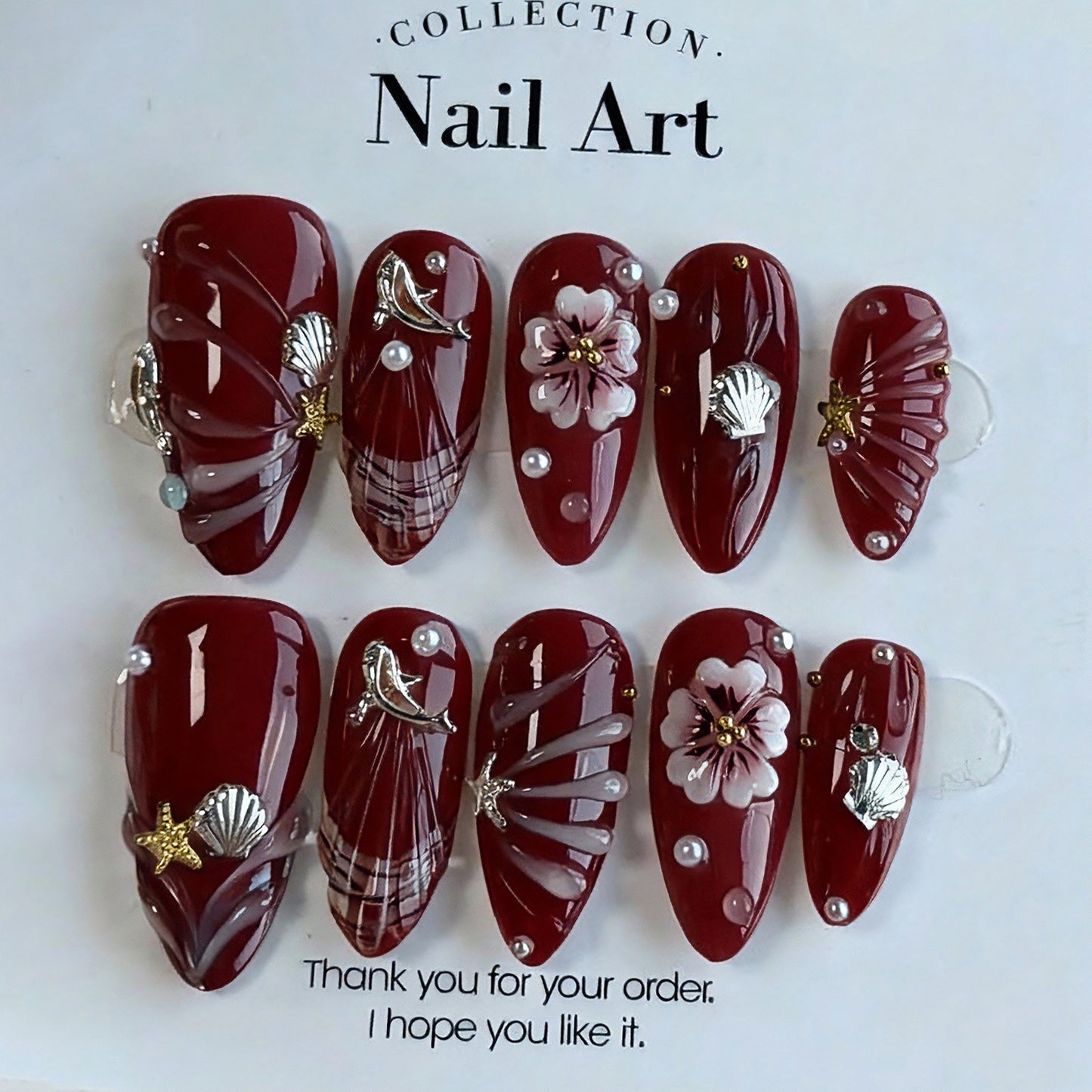 Coastal Elegance Long Almond Burgundy with Floral and Shell Accents Press On Nail Set