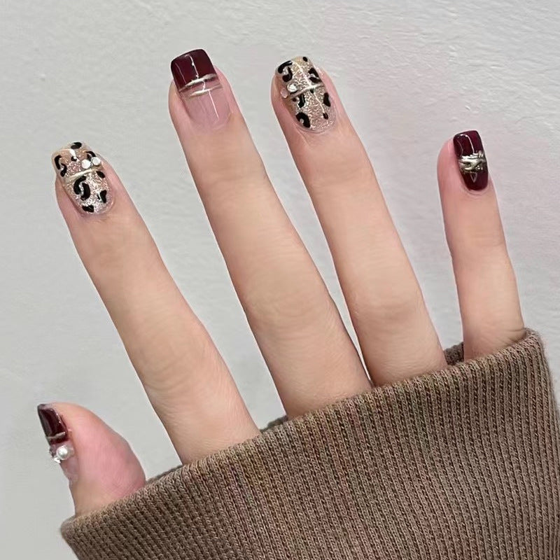 Glamourous Short Square Burgundy Press On Nail Set with Elegant Gold Accents