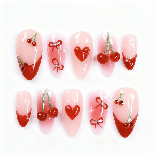 Cherry Blossom Inspired Long Almond Pink Nails with Charming Floral Designs