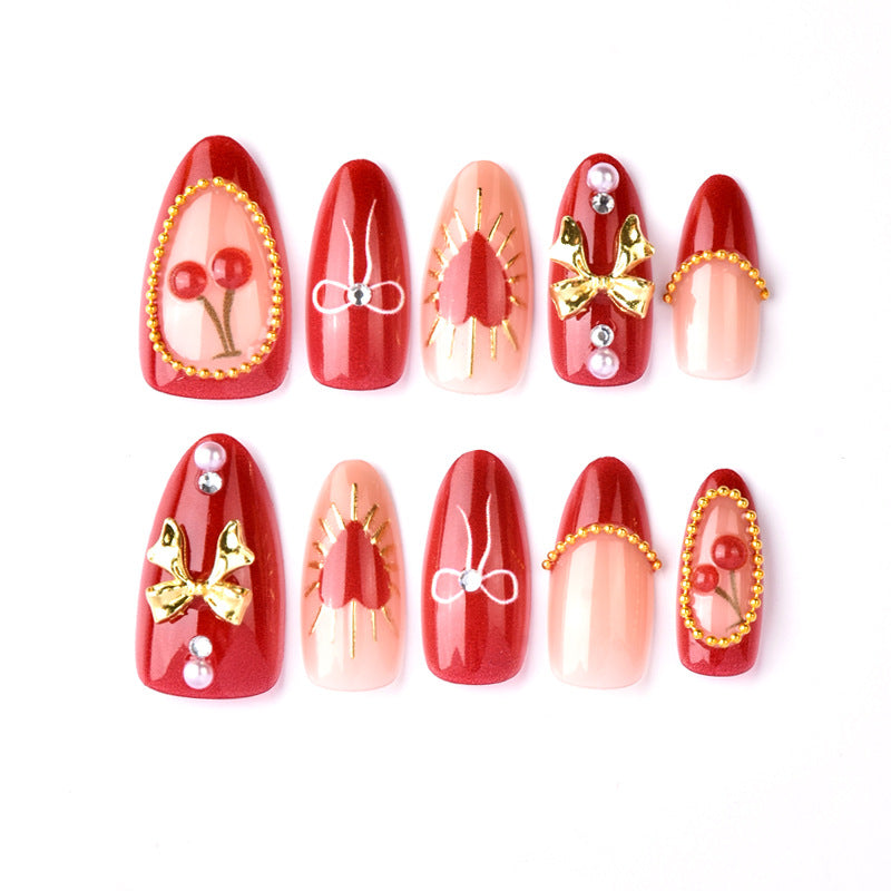 Festive Glamour Short Almond Red Press on Nail Set with Gold Accents and Decorative Gems
