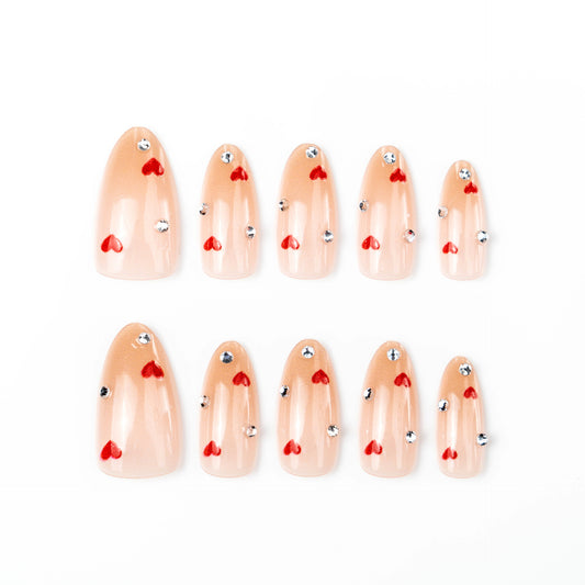 Romantic Vibes Long Almond Beige Press on Nail Set with Heart and Rhinestone Accents