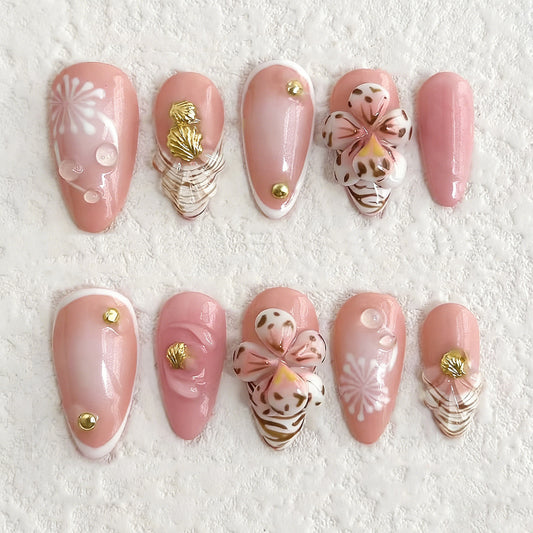 Whimsical Floral Medium Oval Pink Nail Set with Elegant Gold Accents