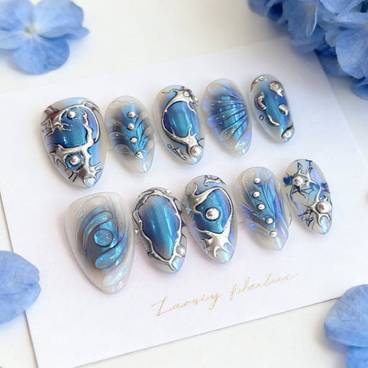Azure Ocean Bliss Medium Almond Blue Nail Set with Dazzling Metallic Accents