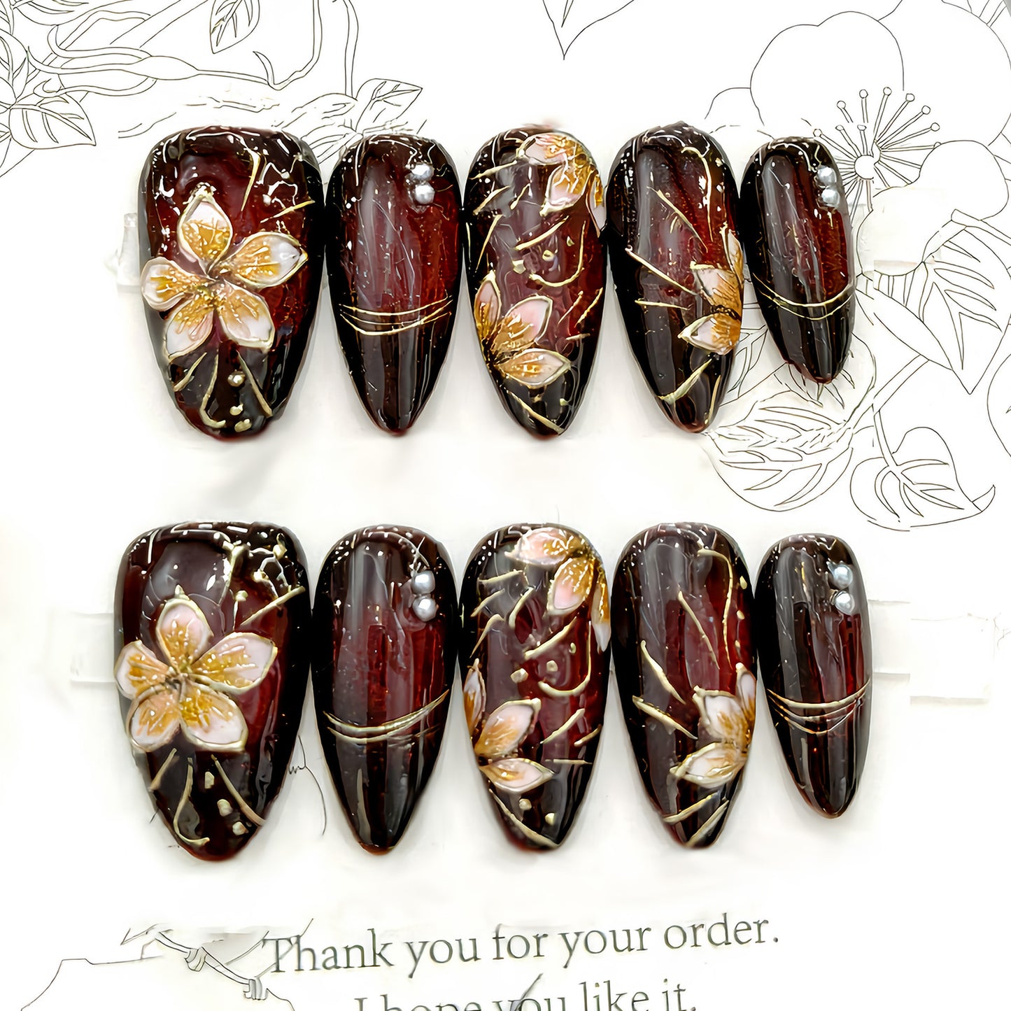 Elegant Floral Glamour Medium Almond Burgundy Gloss with Golden Accents Nail Set