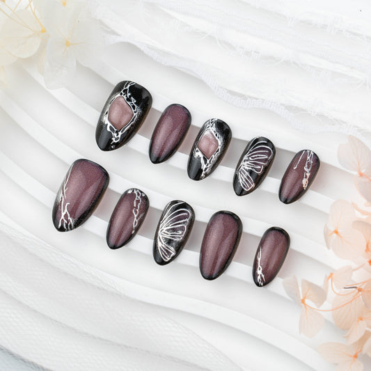 Mystical Elegance Medium Stiletto Black and Plum Nail Set with Intricate Metallic Designs