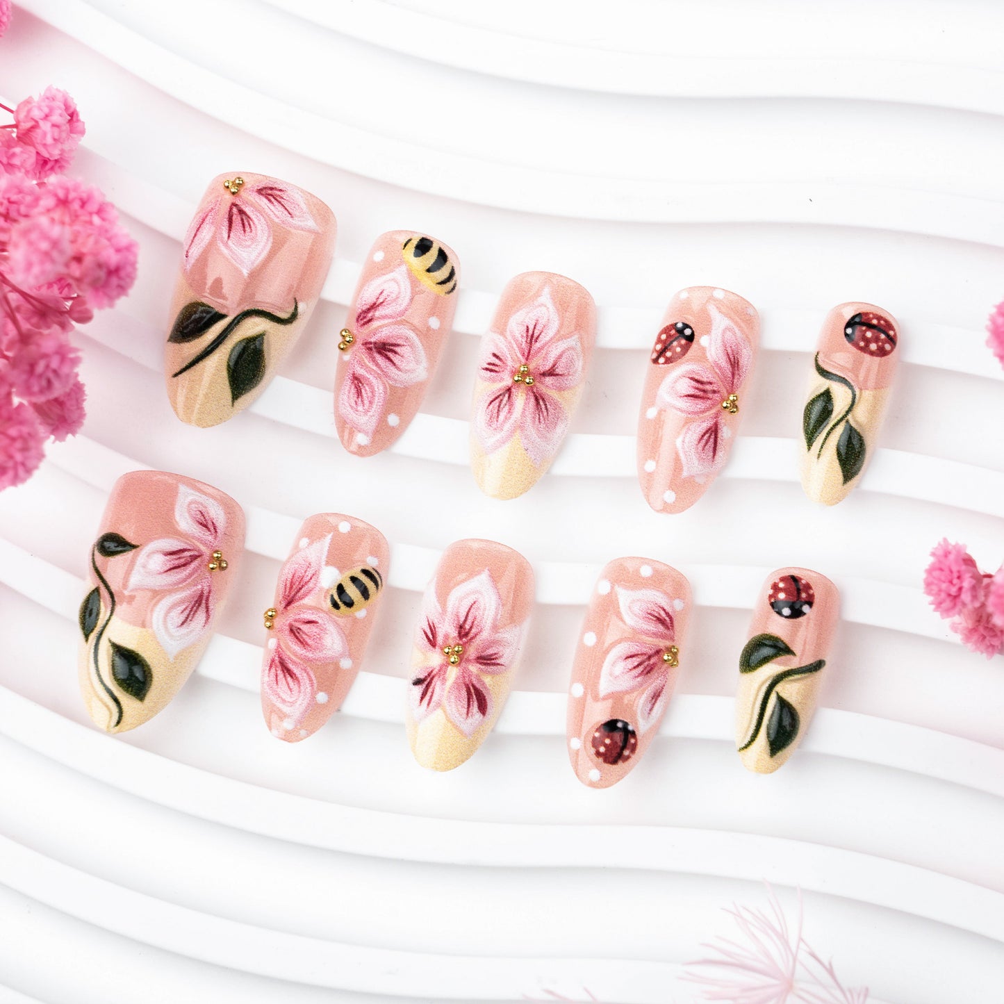 Blooming Floral Medium Almond Pink Press On Nail Set with Elegant Hand-Painted Design