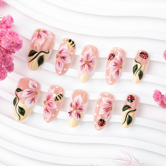 Blooming Floral Medium Almond Pink Press On Nail Set with Elegant Hand-Painted Design