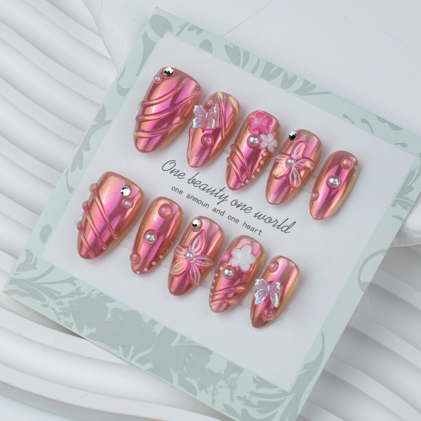 Charming Blossom Medium Almond Pink Glossy Nails with Elegant Floral Accents