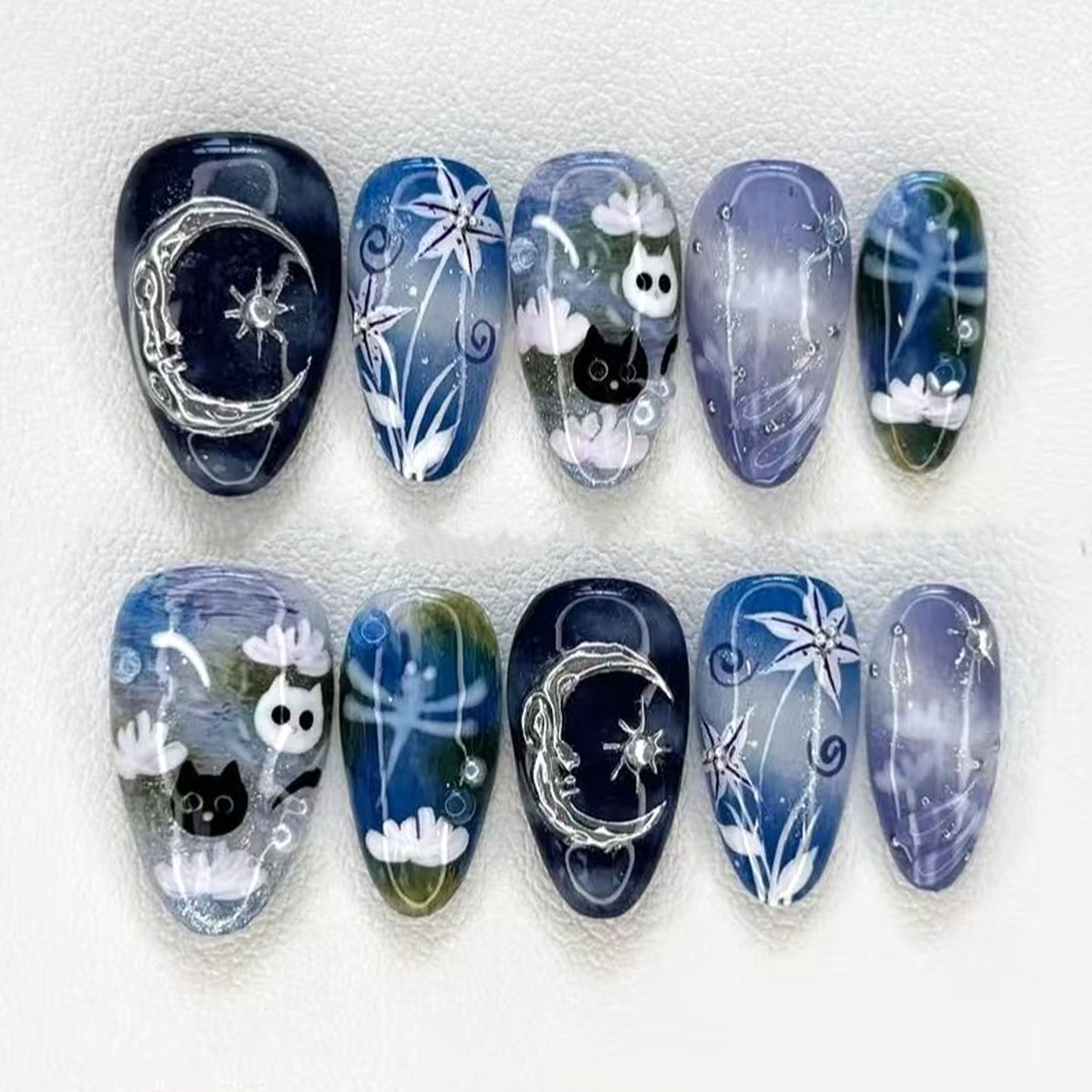 Mystical Moonlight Medium Almond Blue Gradient Press On Nail Set with Artistic Designs