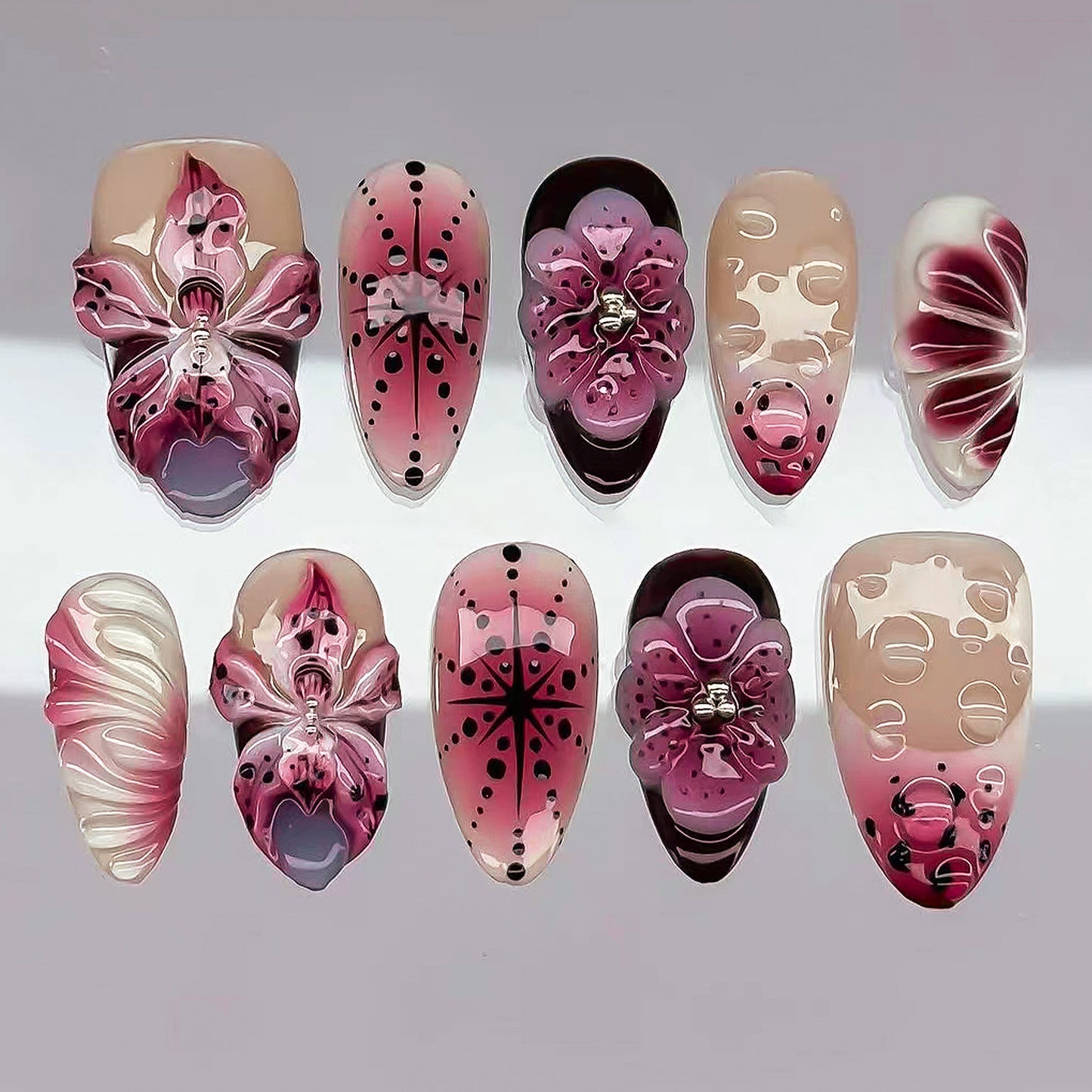 Elegant Floral Fantasy Medium Almond Pink Press On Nail Set with Intricate Flower Designs