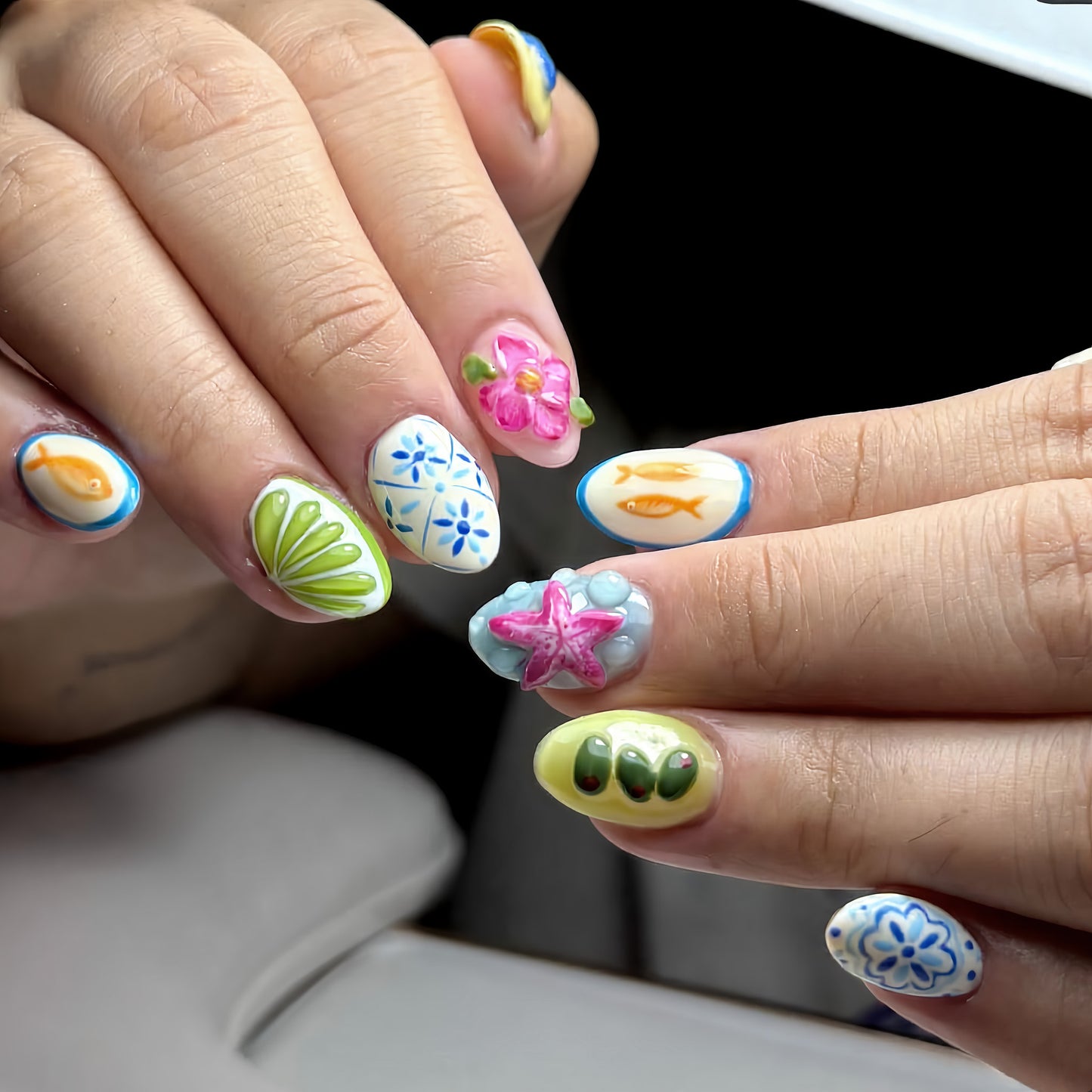 Tropical Paradise Short Almond Pastel Nail Set with Floral and Aquatic Designs