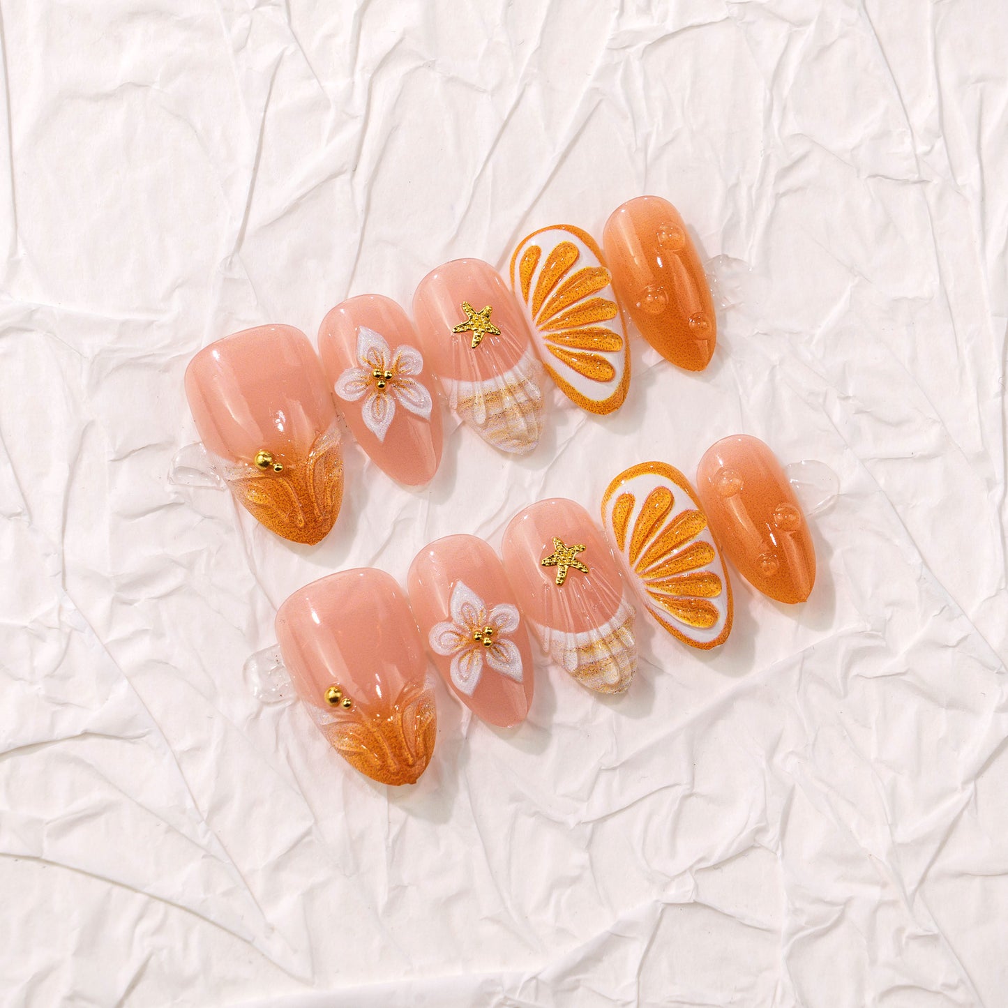 Citrus Delight Long Almond Peachy Nails with Glamorous Gold Accents