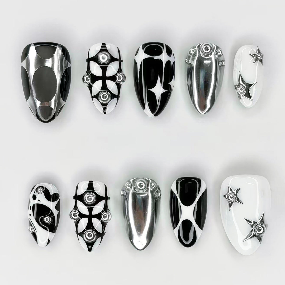 Chic Galaxy Black and White Medium Almond Press On Nail Set with Unique Star Accents