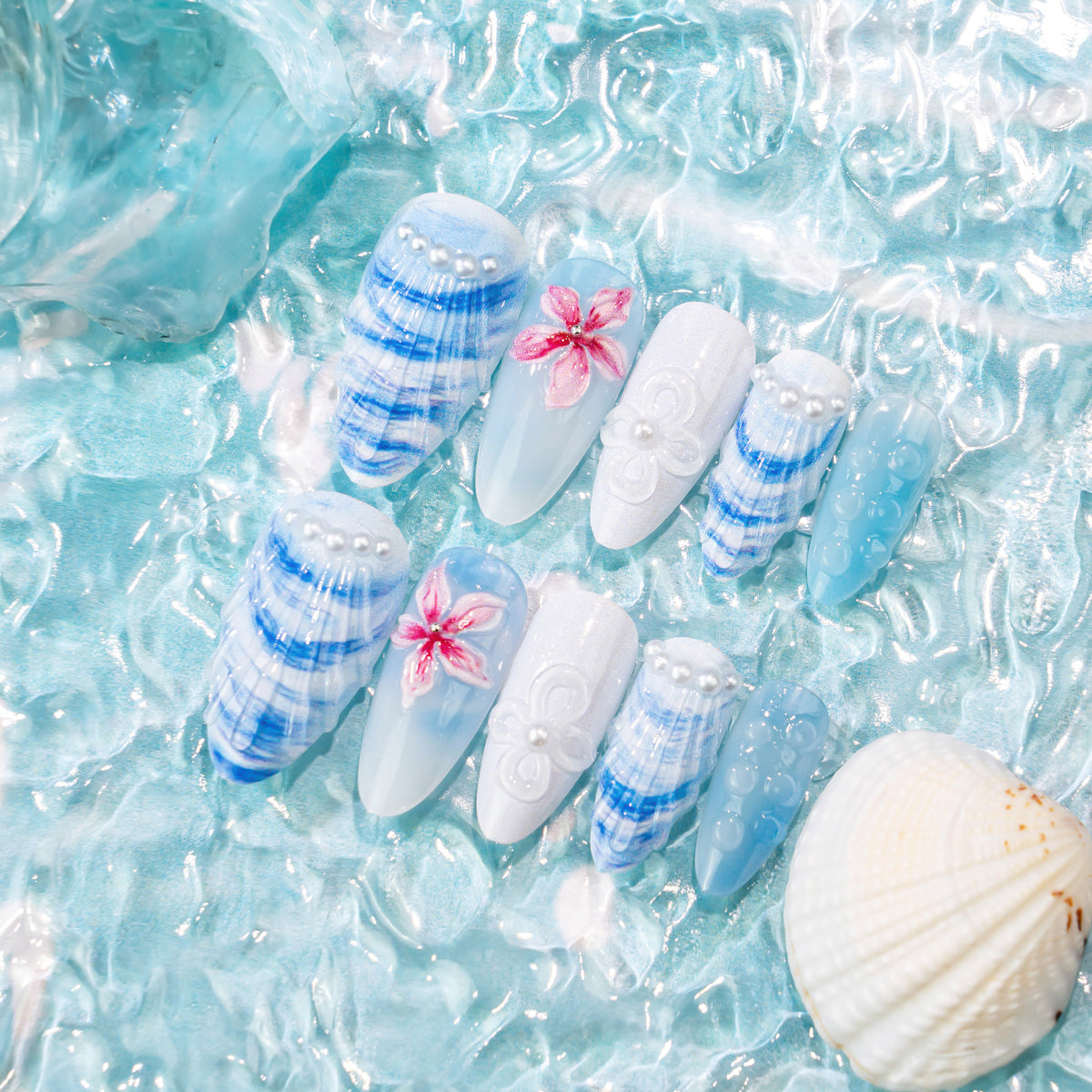 Ocean Breeze Medium Almond Light Blue with Floral Embellishments Press On Nail Set