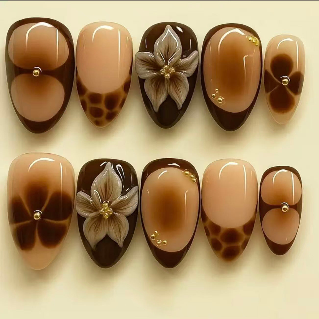 Bohemian Elegance Medium Almond Brown Floral Press On Nail Set with Unique Gilded Accents