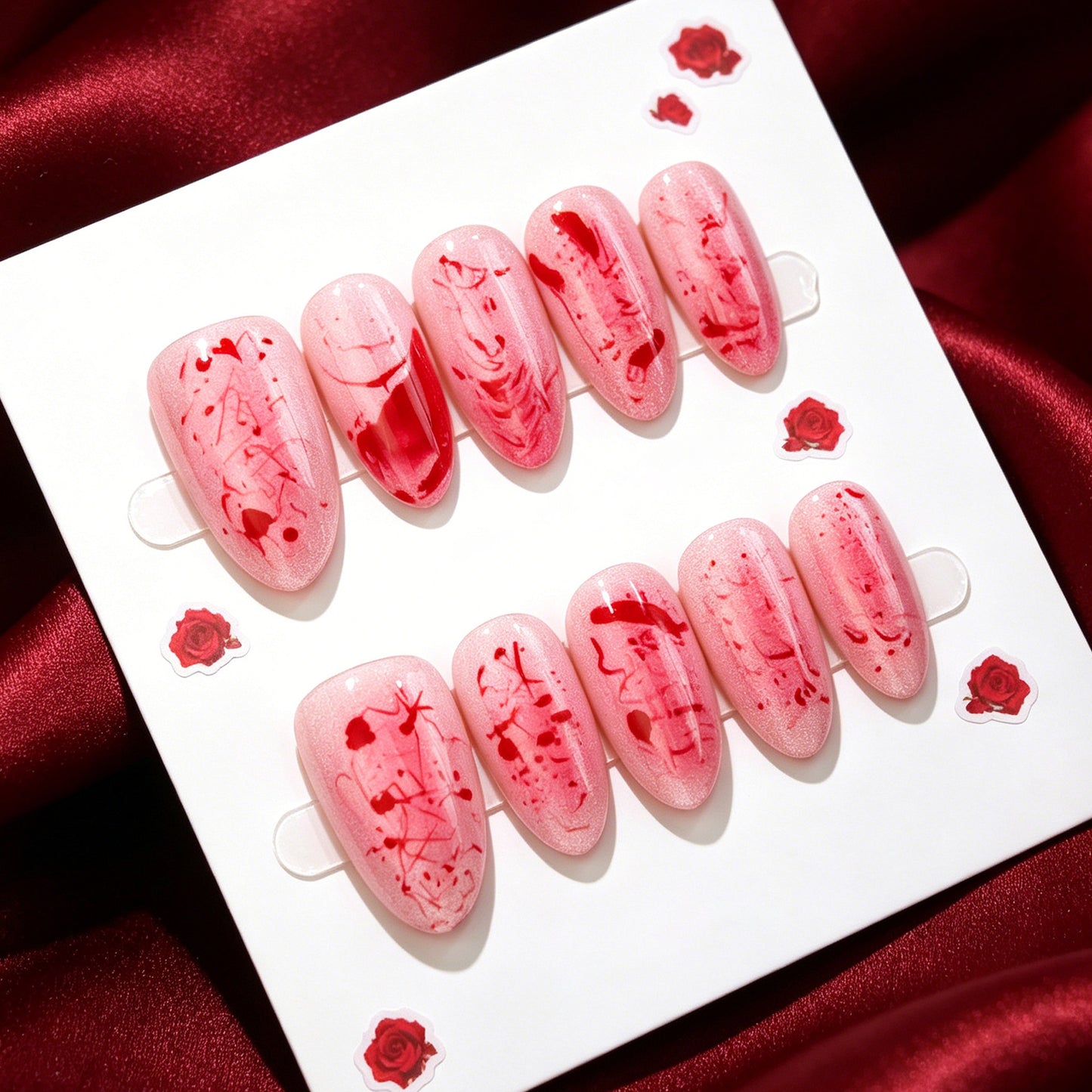 Romantic Rose Inspired Medium Almond Pink Nails with Unique Abstract Design