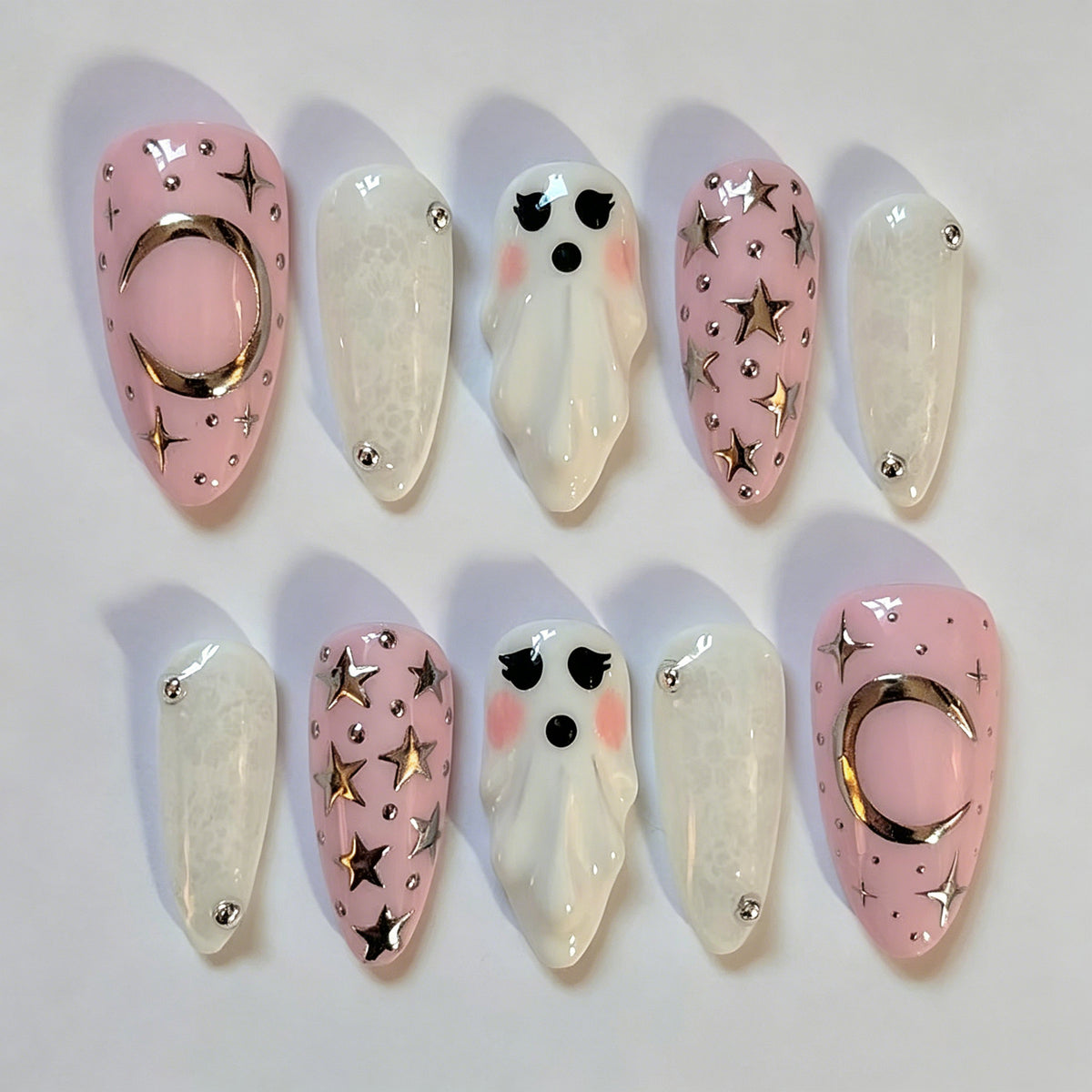 Whimsical Ghost Theme Medium Almond Pink Press On Nail Set with Star and Moon Details