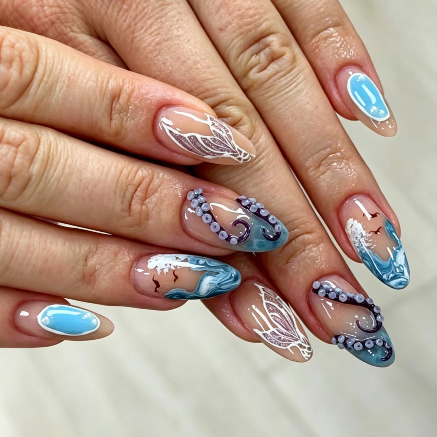 Ocean Breeze Medium Almond Blue Nail Set with Unique Textured Design