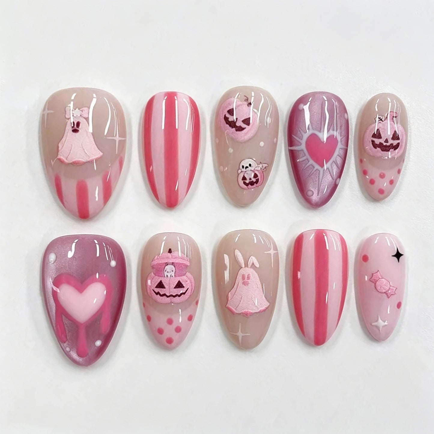 Whimsical Halloween Short Almond Pink Press On Nail Set with Fun Ghost and Pumpkin Designs
