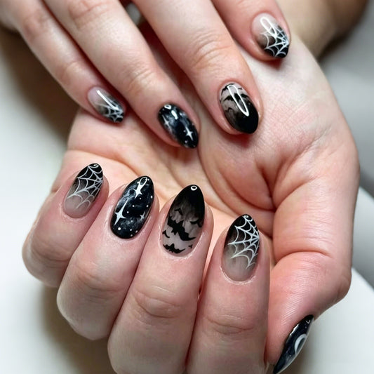 Spooky Glamour Medium Almond Black Nail Set with Intricate Spiderweb Design