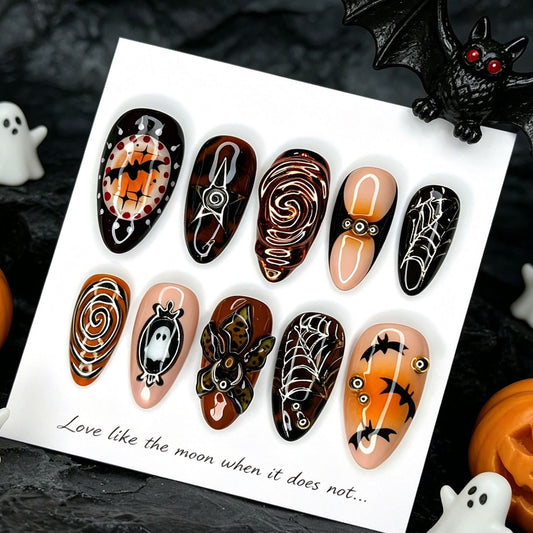Spooky Glam Medium Almond Orange Black Press On Nail Set with Unique Halloween Designs
