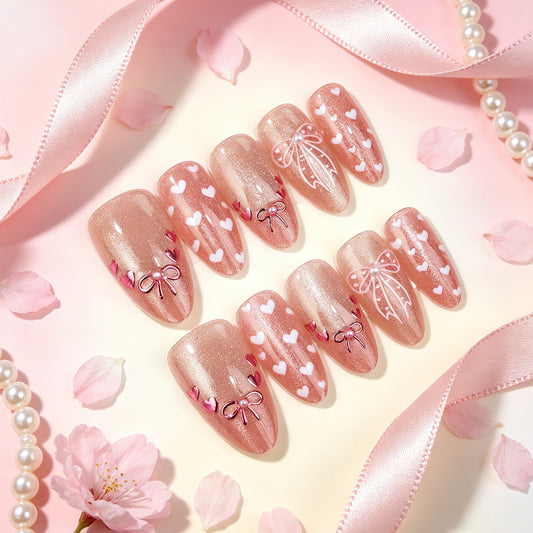 Romantic Long Almond Pink Sparkle Nail Set with Heart and Bow Designs