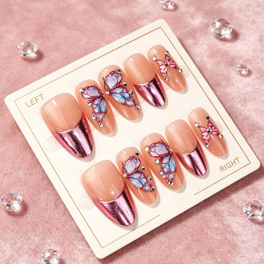 Whimsical Butterfly Design Long Oval Pink Nail Set with Glamorous Metallic Accents