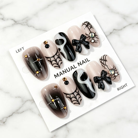 Spooky Glam Medium Almond Black and Beige Nail Set with Rhinestone Bows and Spider Web Design