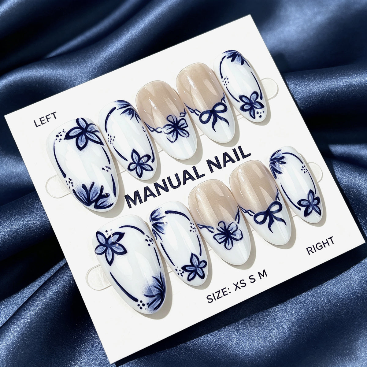 Floral Elegance Medium Oval Navy Blue Press On Nail Set with Intricate Flower Design