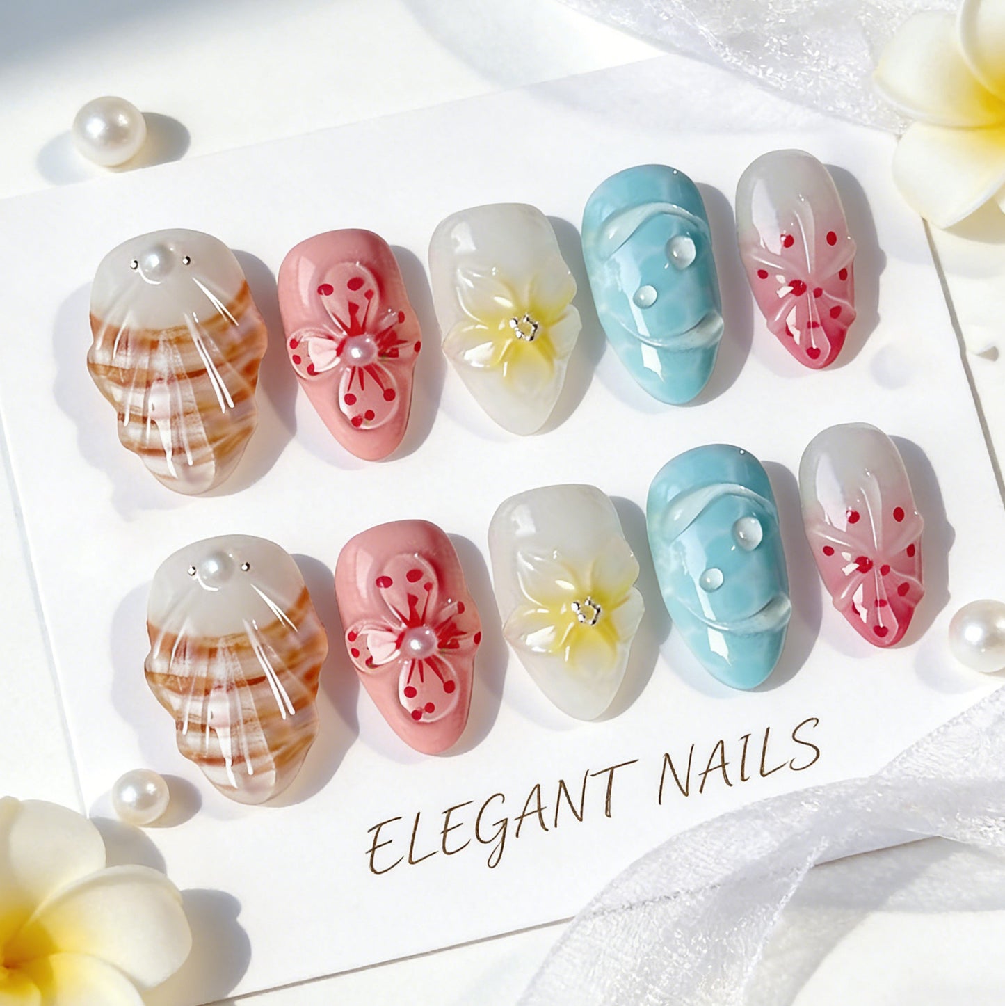 Floral Beach Vibes Short Almond Pink and Blue Press-On Nail Set with Decorative Flowers and Pearls