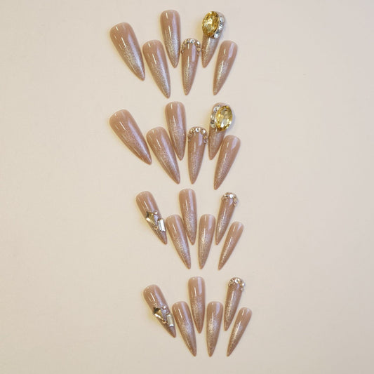 Glamorous Elegance Pointed Long Stiletto Beige Press On Nail Set Featuring Stunning Rhinestone Accents