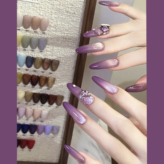 Charming Elegance Long Almond Purple Ombre Nails with Glitter and Gemstone Accent