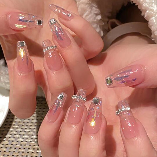 Elegant Sparkle Long Coffin Clear Press On Nail Set with Glitter Accents and Rhinestone Embellishments