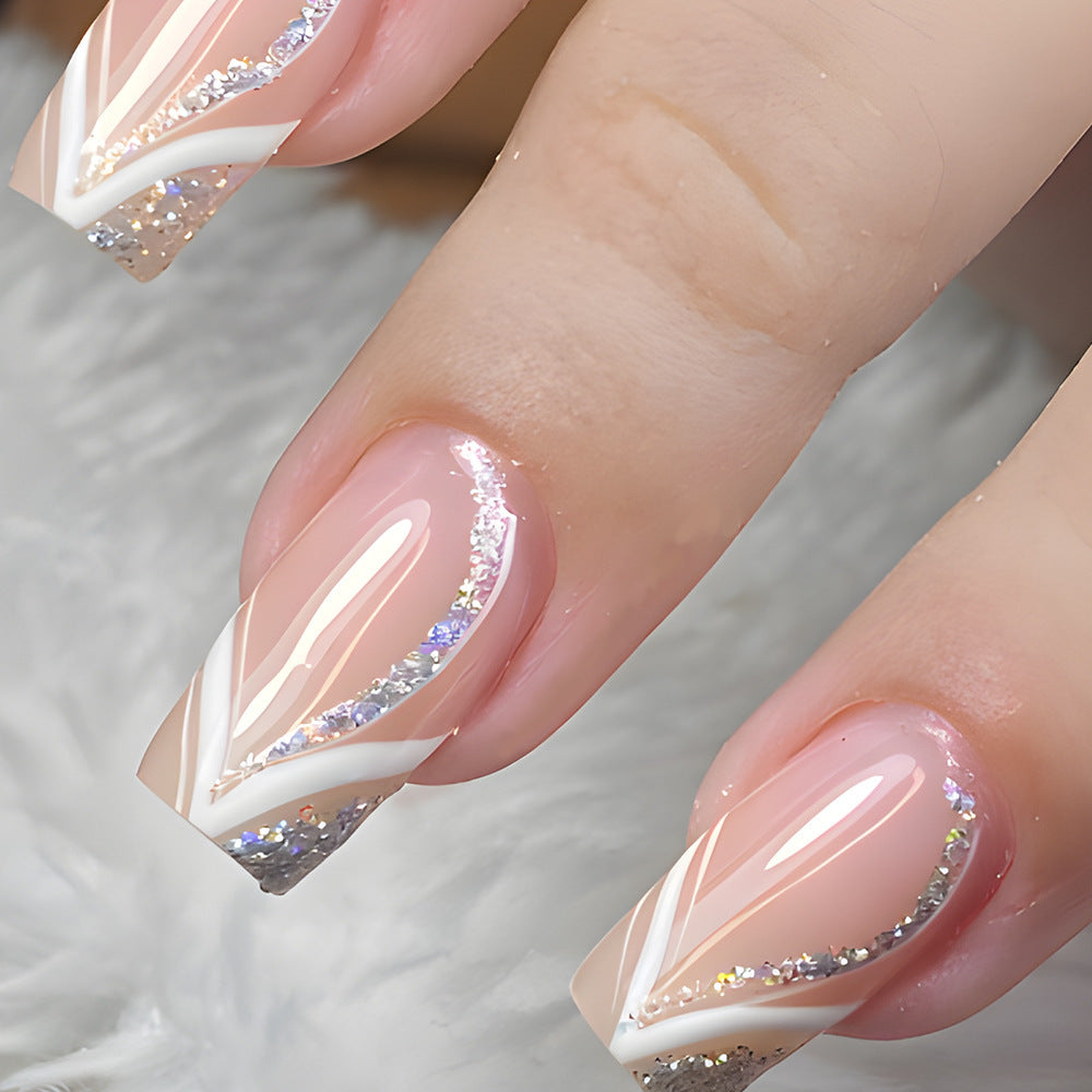 Glamorous Elegance Long Square Beige Press On Nail Set with Glitter Accent and Chic White Swirls