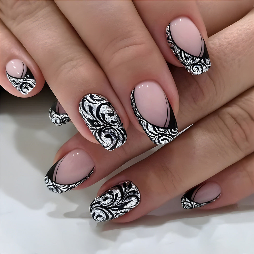 Elegant Swirl Design Long Squoval Press On Nail Set in Soft Pink and Striking Black with Silver Glitter Accents
