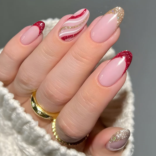 Festive Elegance Long Almond Pink Red and Gold Glitter Press On Nail Set with Unique Holiday Swirl Design