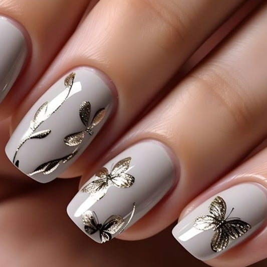 Whimsical Elegance Medium Square Gray Nails with Metallic Butterfly and Leaf Design