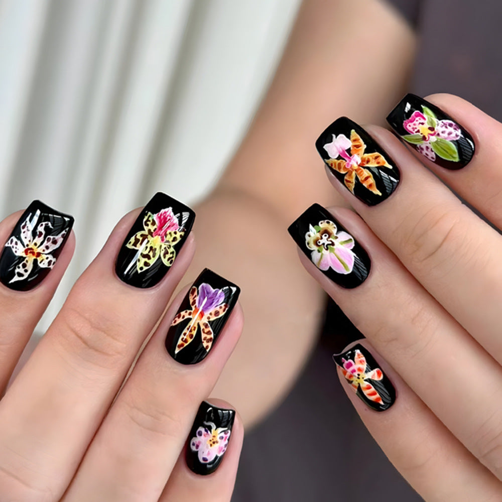 Tropical Bloom Short Square Black Floral Press-On Nail Set with Intricate Orchid Designs