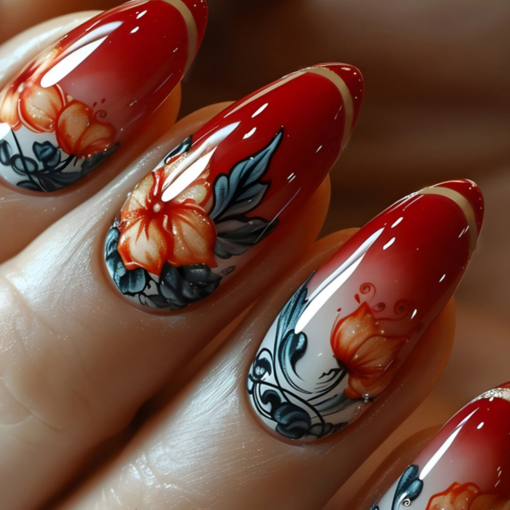 Charming Floral Elegance Medium Almond Shaped Glossy Red Nail Set with Intricate Hand-Painted Designs