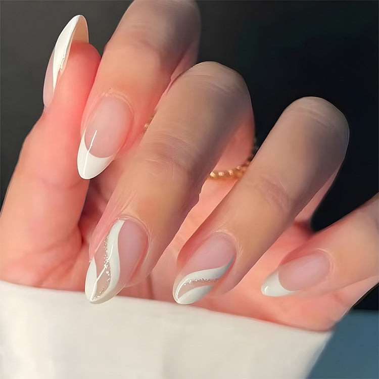 Elegant Dream White Medium Almond Shaped Press on Nail Set with Unique Glitter Accent Feature